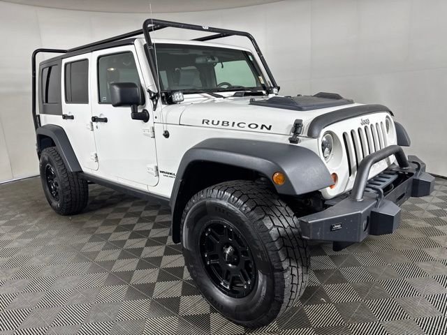 Used 2010 White Jeep Unlimited Rubicon image 1