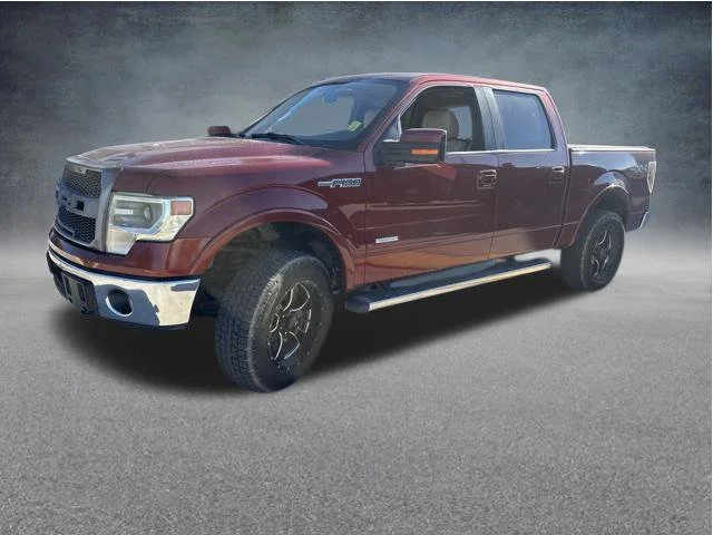 Used 2014 Orange Ford Lariat image 2