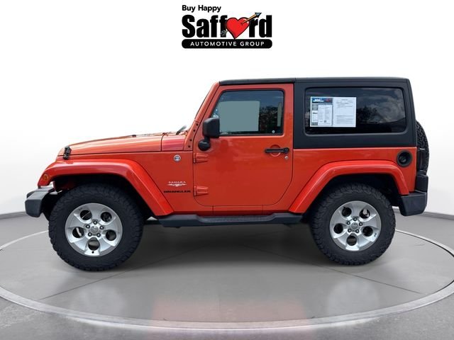 Used 2015 Orange Jeep Sahara image 4