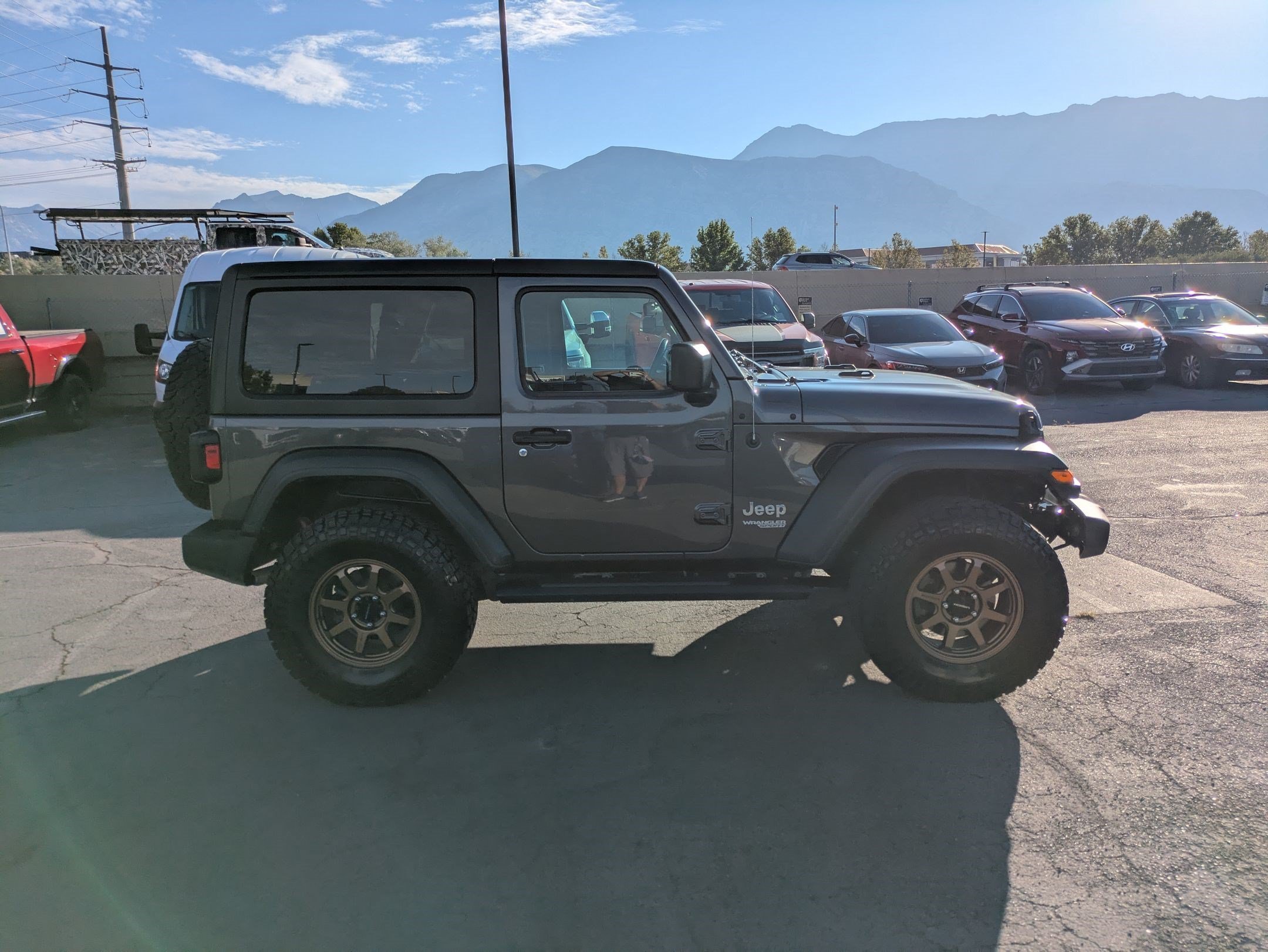 Used 2018 Granite Crystal Clearcoat Metallic Jeep Sport S image 2