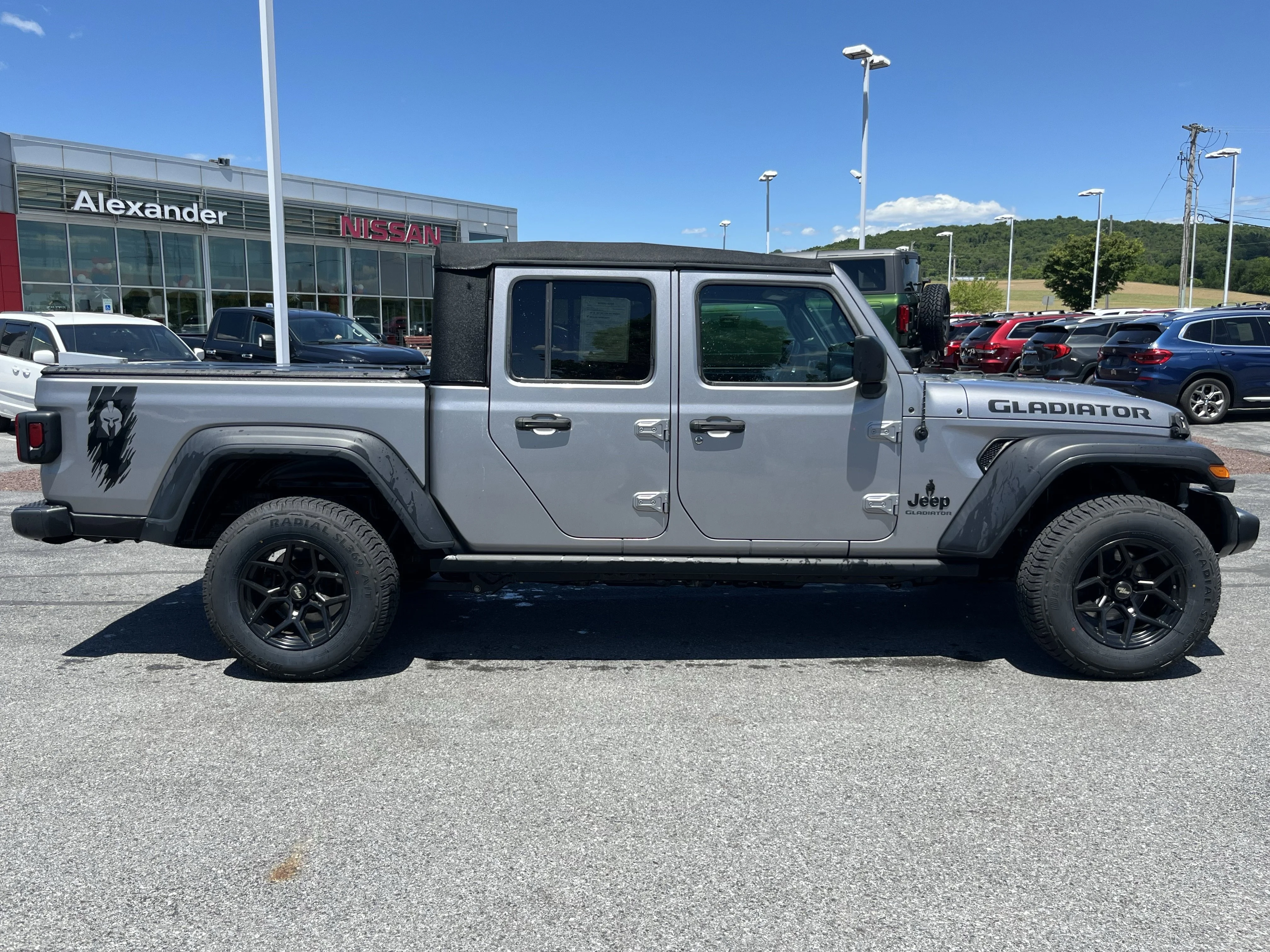 Used 2020 Billet Silver Metallic Jeep Sport image 2
