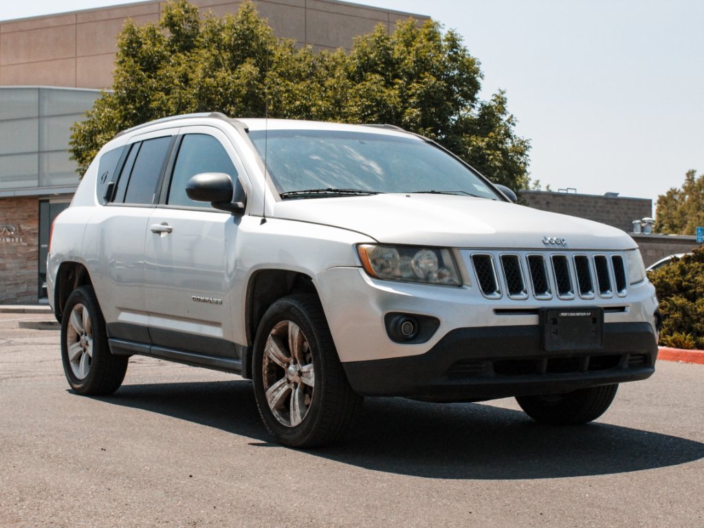 Used 2012 Bright Silver Metallic Clearcoat Jeep Sport image 3