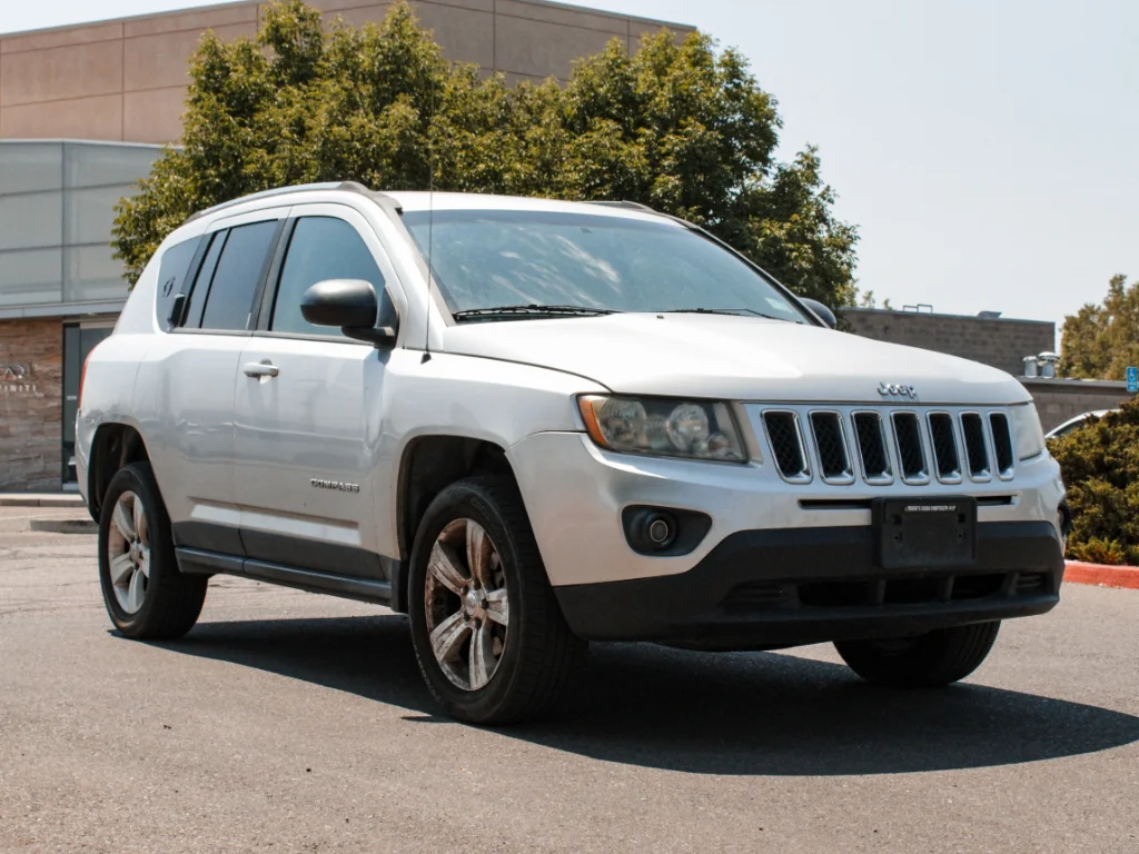 Used 2012 Bright Silver Metallic Clearcoat Jeep Sport image 3
