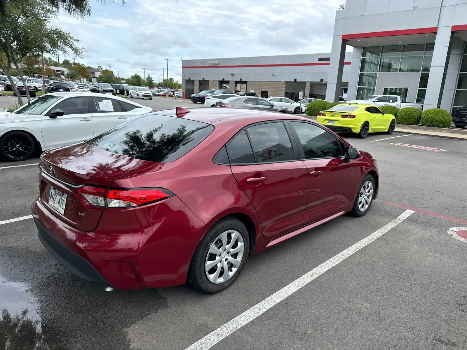 Used 2023 Ruby Flare Pearl Toyota LE image 3