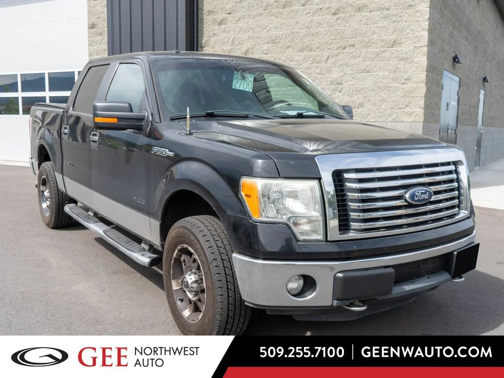 Used 2011 Black Ford XLT image 1