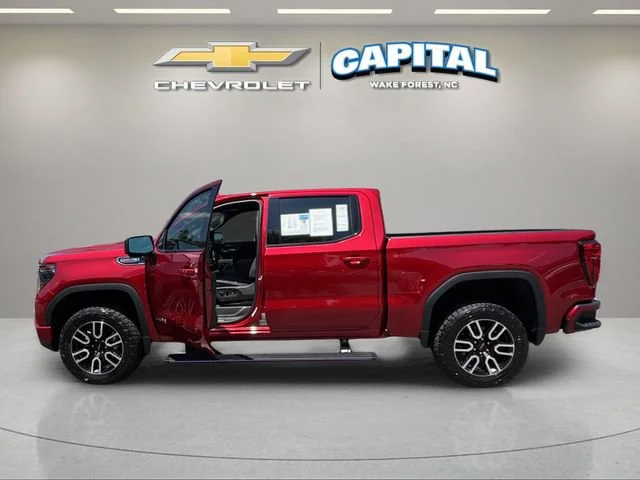 Used 2026 Volcanic Red Tintcoat GMC AT4 image 9
