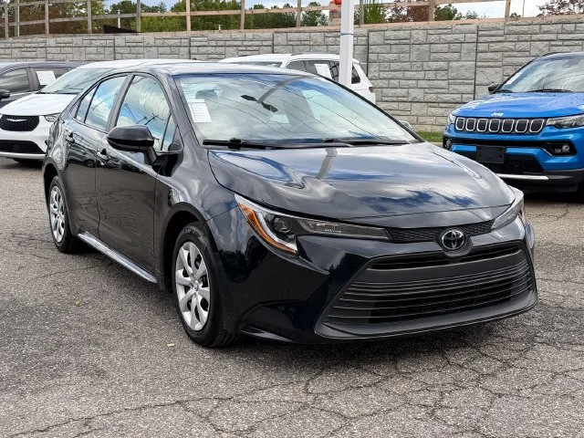 Used 2025 Midnight Black Metallic Toyota LE image 7