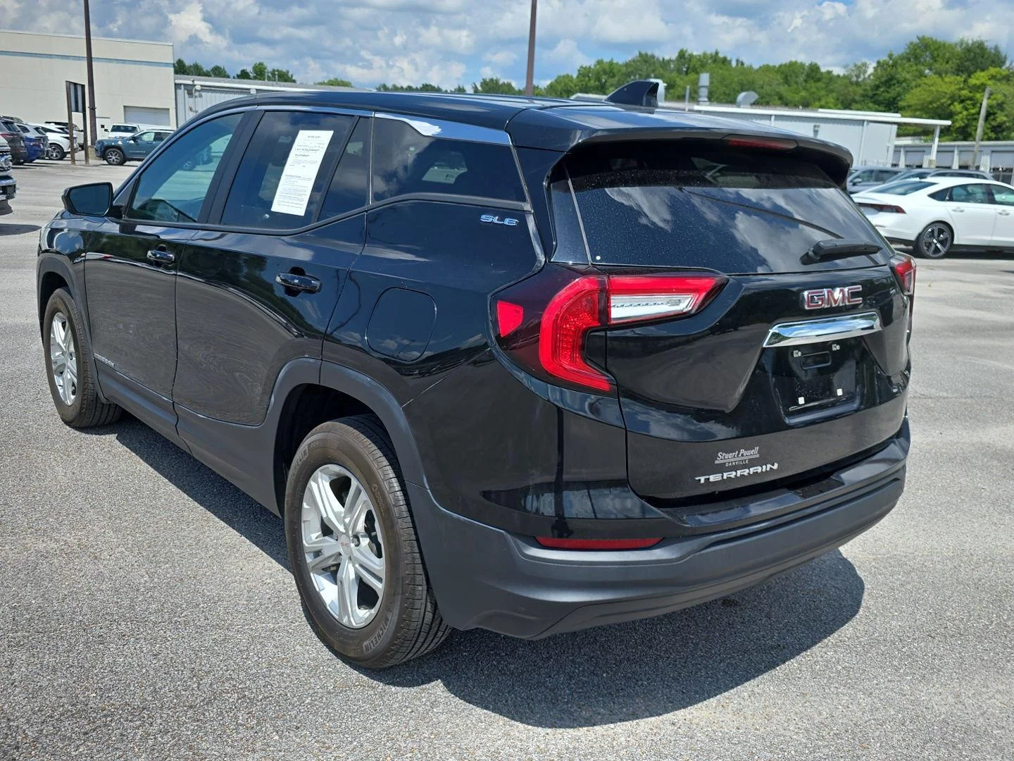 Used 2024 Ebony Twilight Metallic GMC SLE image 6