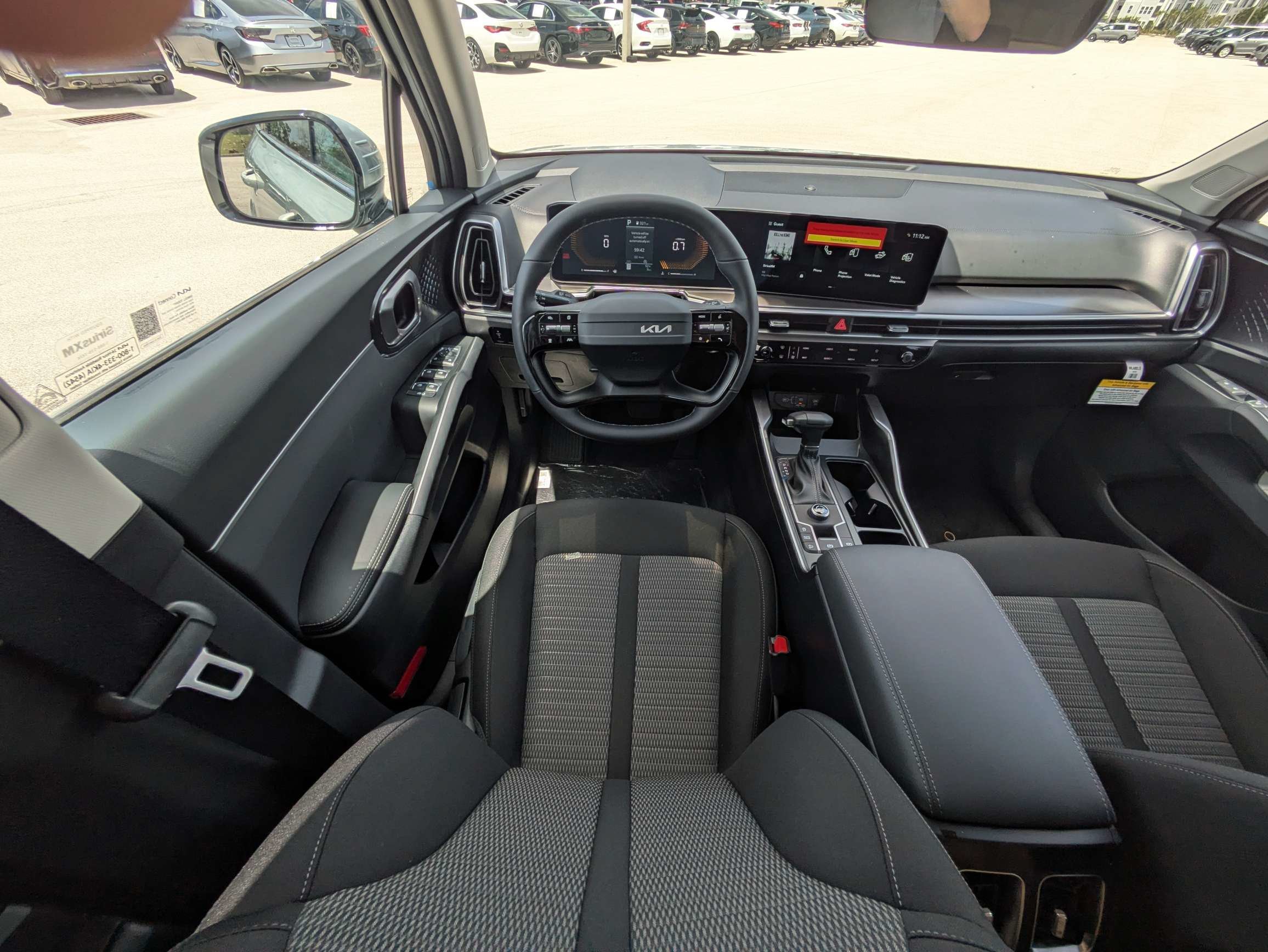 New 2026 Ivory Silver Kia LX image 18