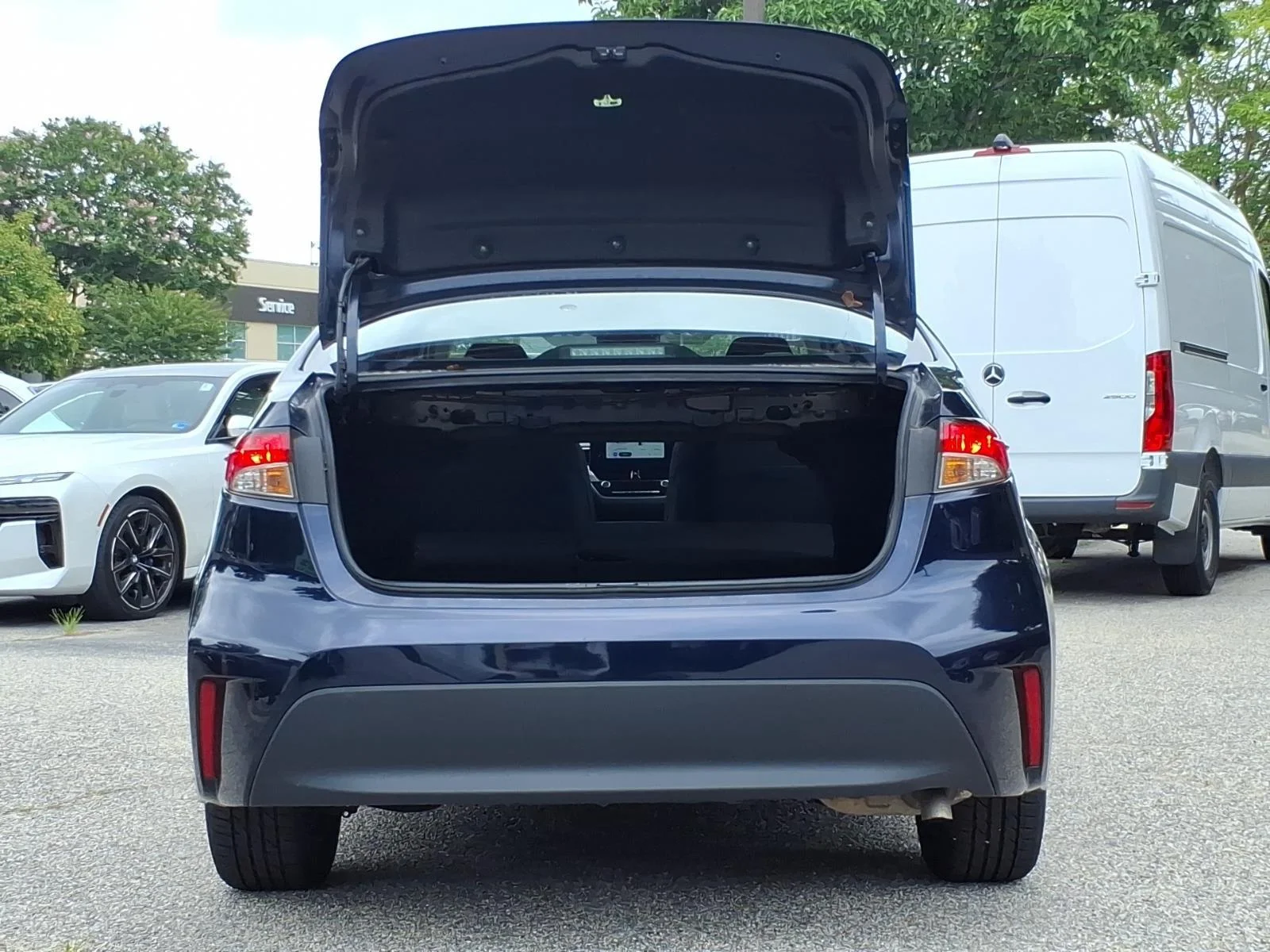 Used 2024 BLUE TOYOTA LE image 30