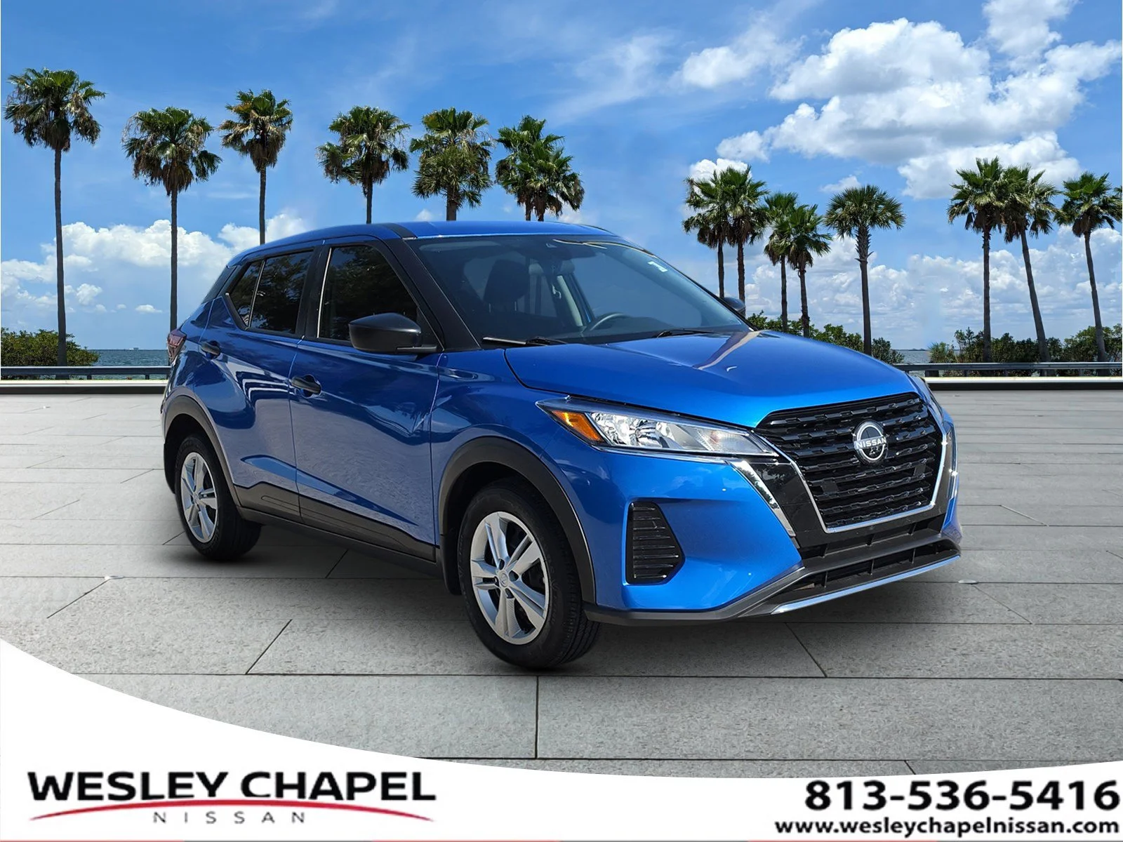 Certified Used 2025 Electric Blue Metallic Nissan S image 1