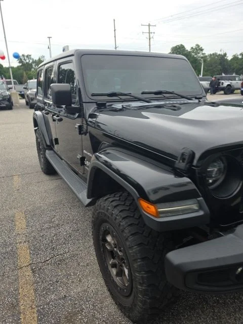 Used 2018 Black Jeep Unlimited Sahara image 3