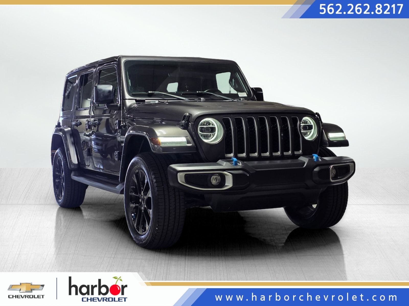 Used 2022 Granite Crystal Metallic Clearcoat Jeep Unlimited Sahara 4xe image 1