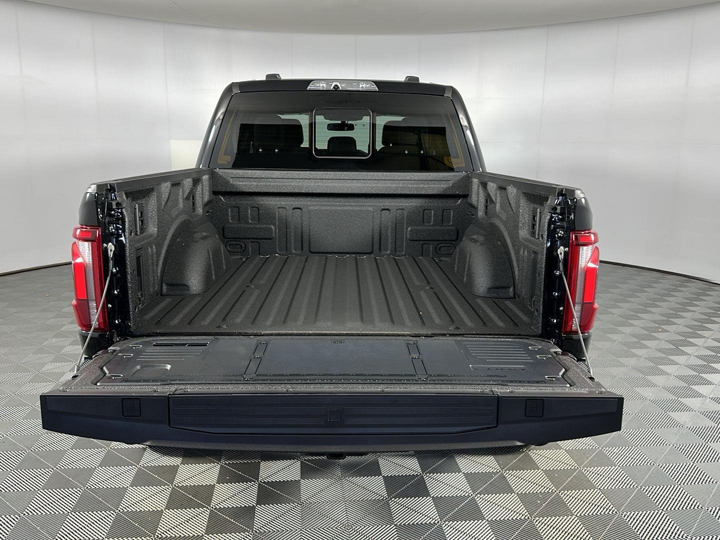 Used 2025 Agate Black Metallic Ford Raptor image 9