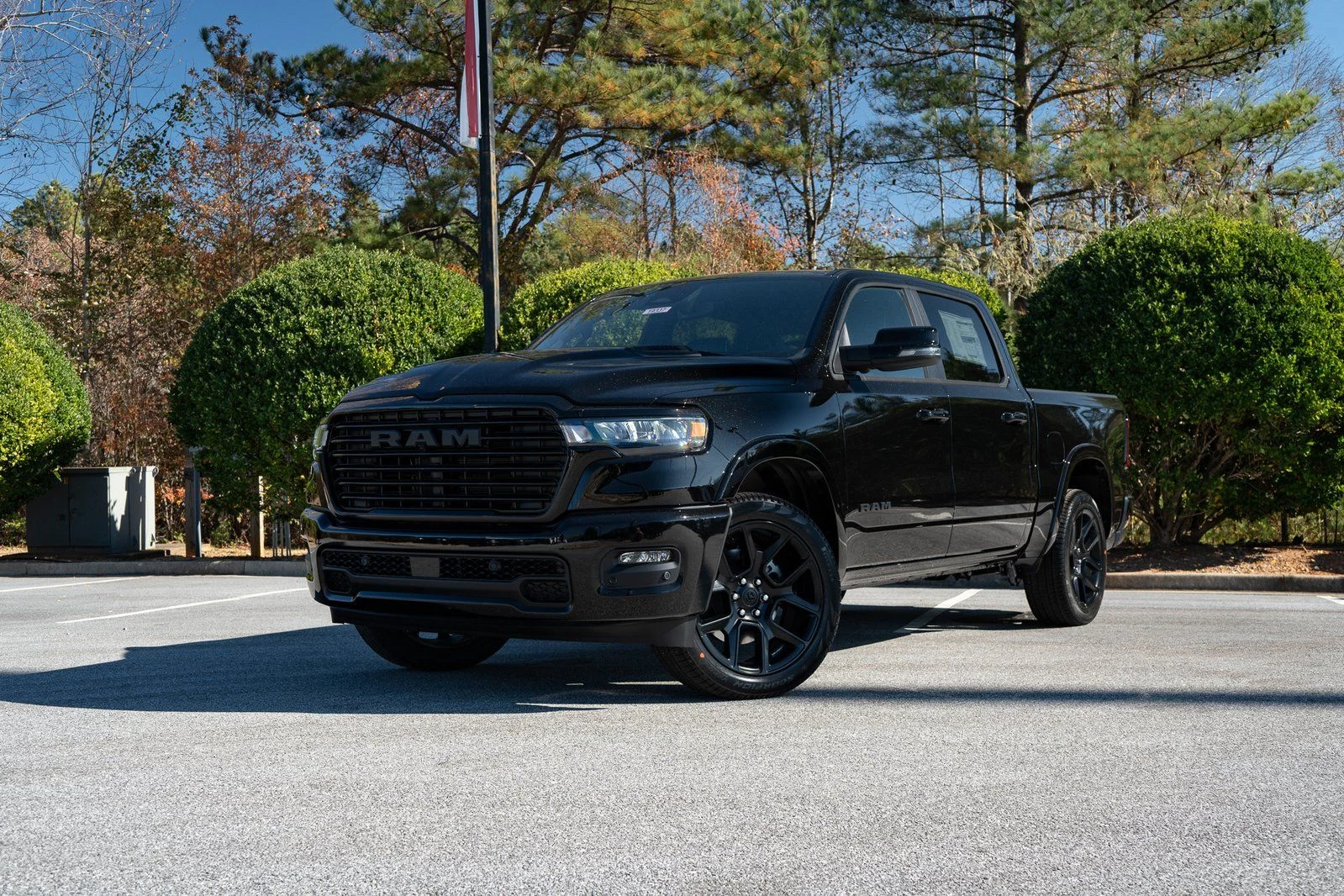 New 2026 Diamond Black Crystal Pearl-Coat Exterior Paint RAM Laramie image 1