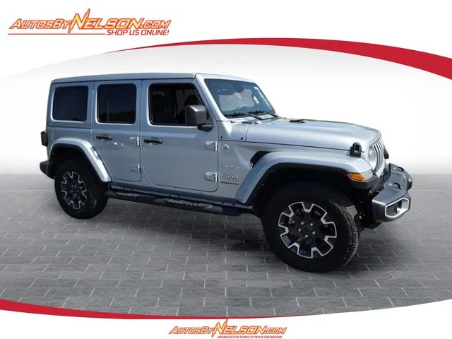 Used 2024 Silver Jeep Sahara image 1