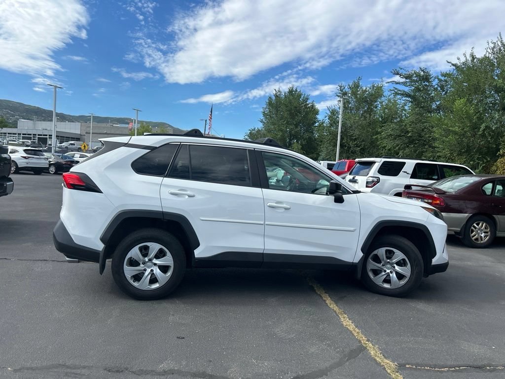 Used 2021 Super White Toyota LE image 4