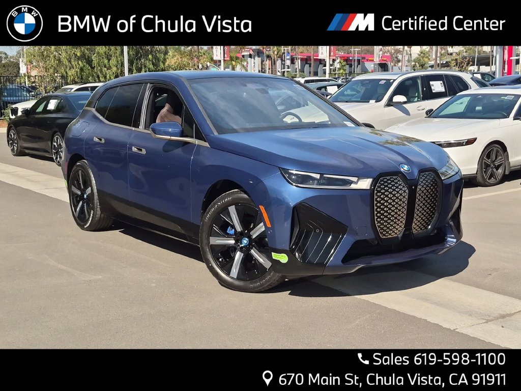 Used 2024 Blue BMW xDrive50 image 1