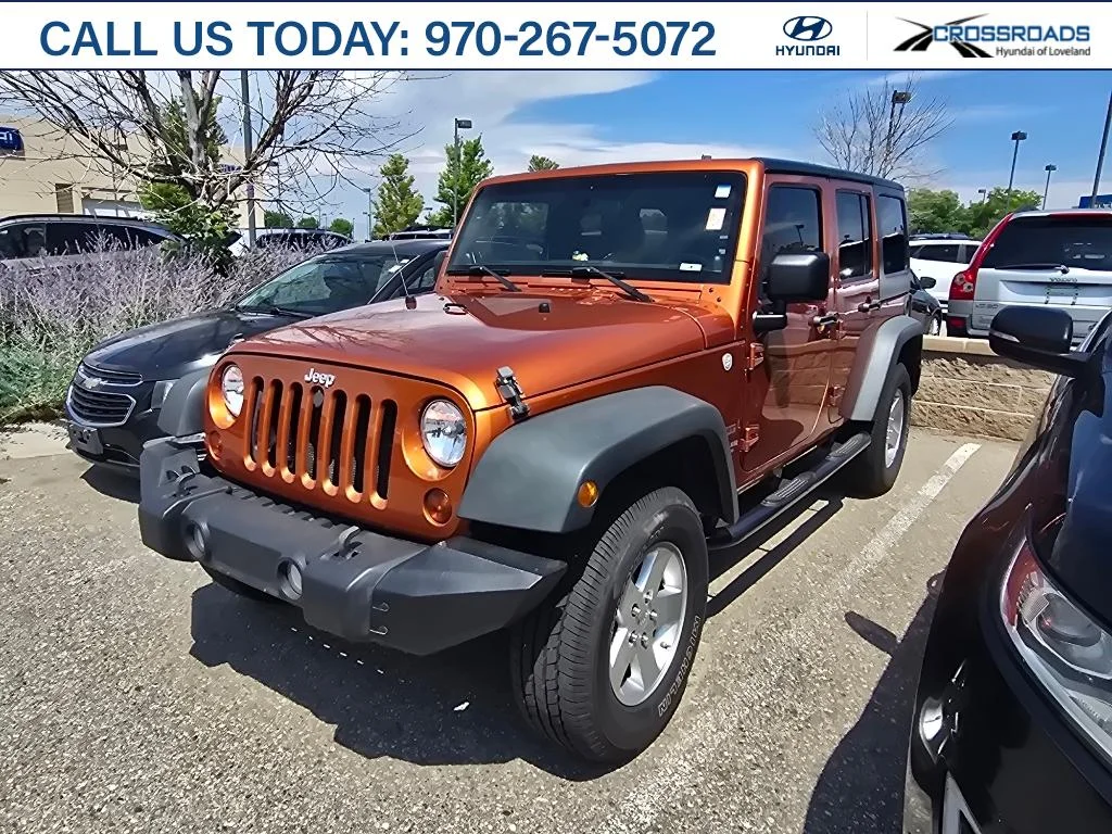 Used 2011 Mango Tango Pearlcoat Jeep Sport image 1