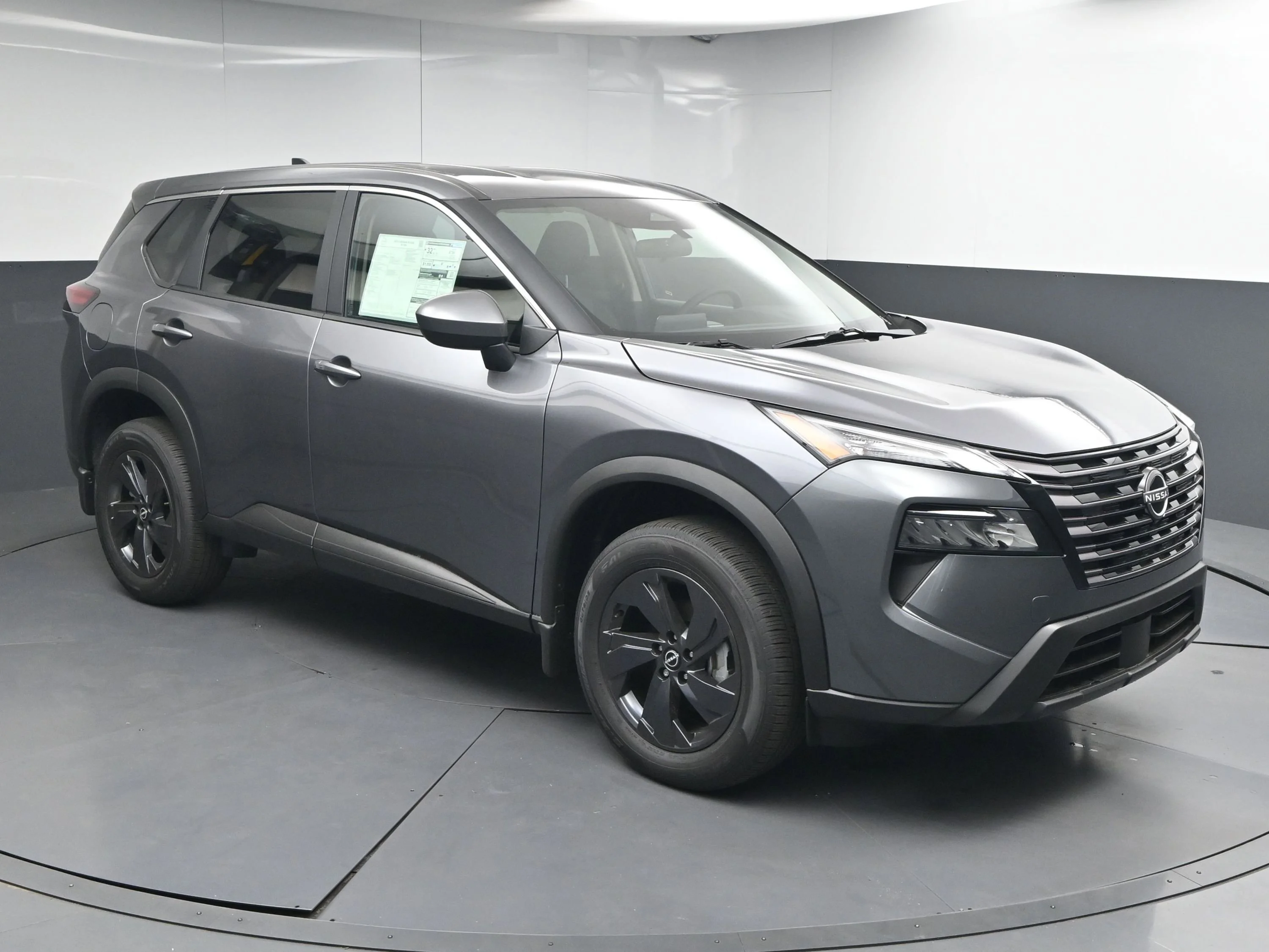 New 2026 Gun Metallic Nissan SV image 1