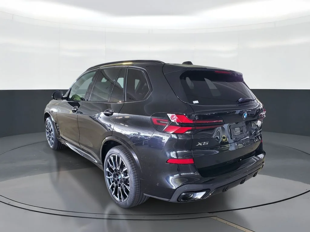 New 2026 Black Sapphire Metallic BMW sDrive40i image 4