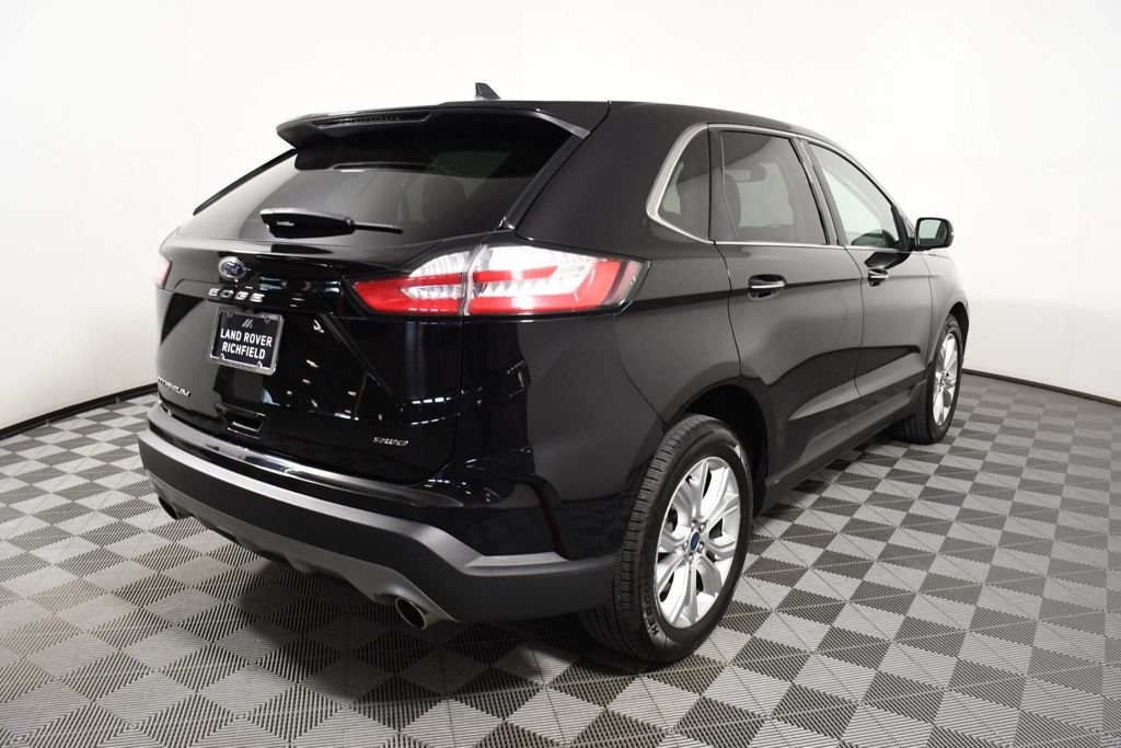 Used 2022 Agate Black Metallic Ford Titanium image 6