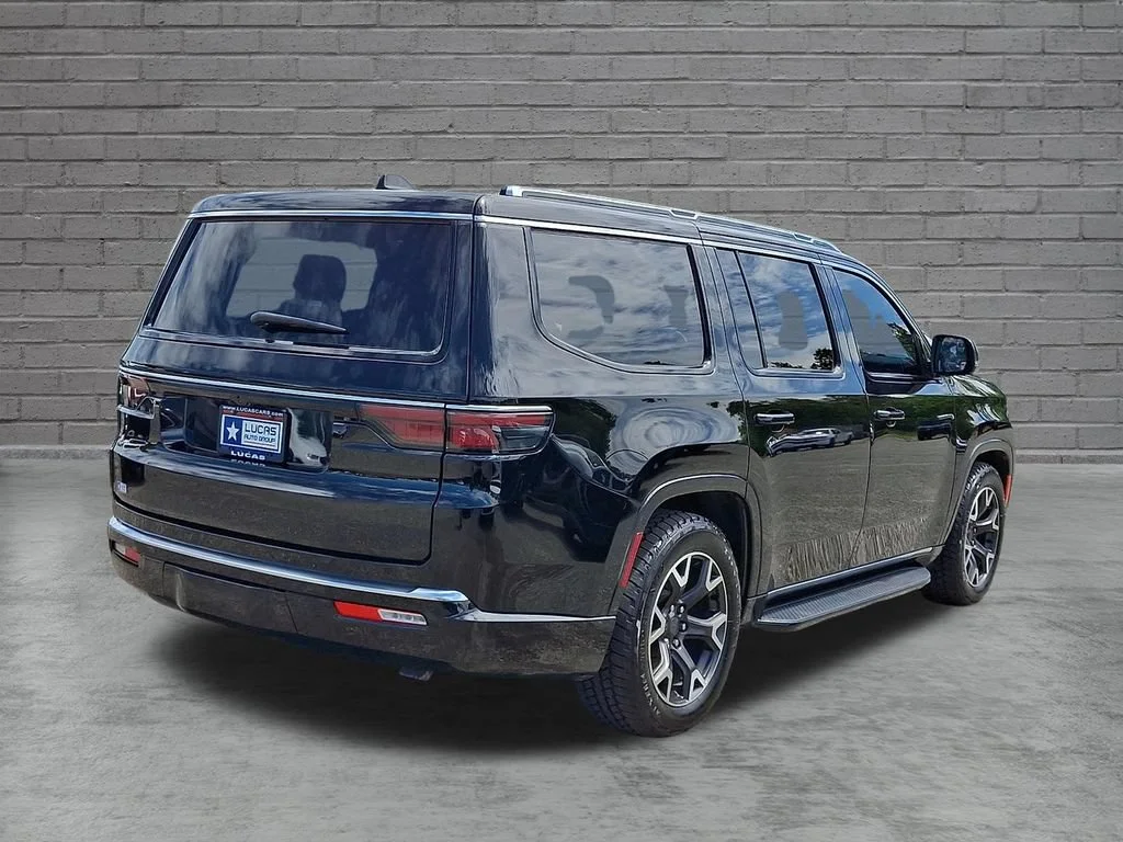 Used 2023 Diamond Black Crystal Pearlcoat Jeep Series III image 12