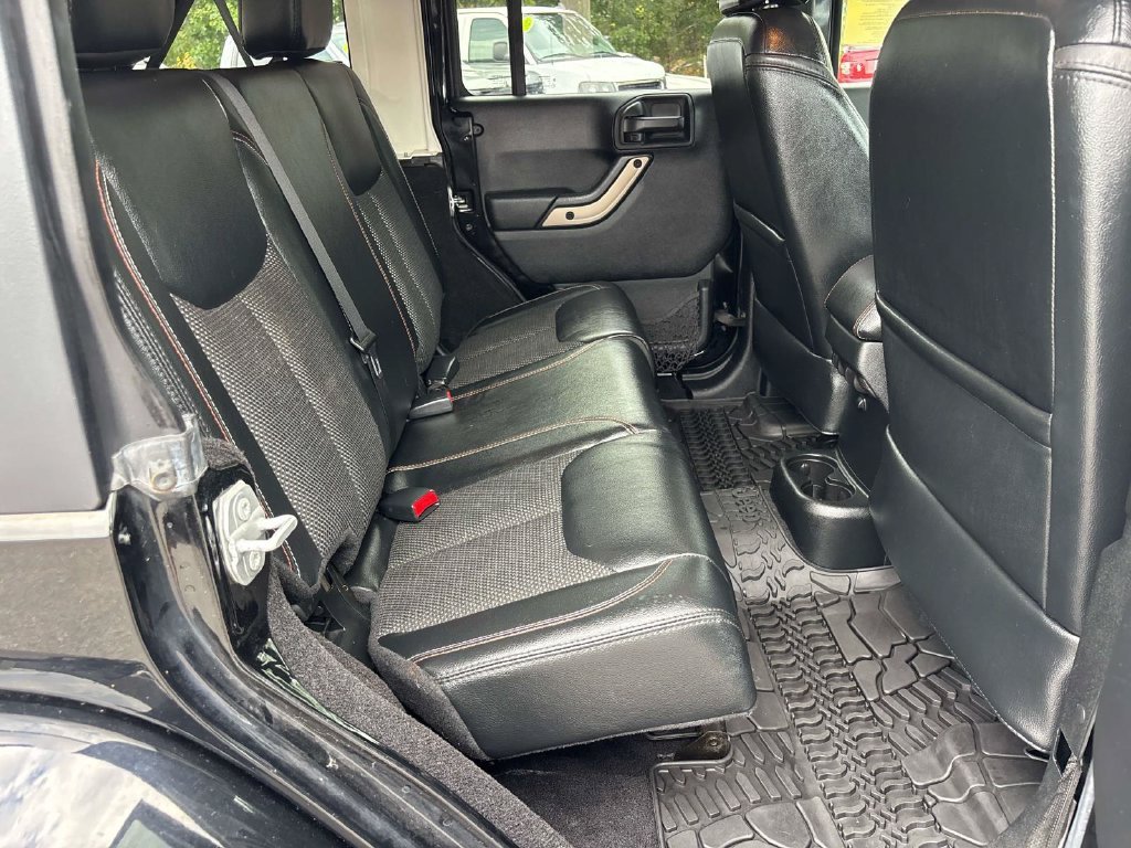 Used 2016 Black Jeep Unlimited Sahara image 13