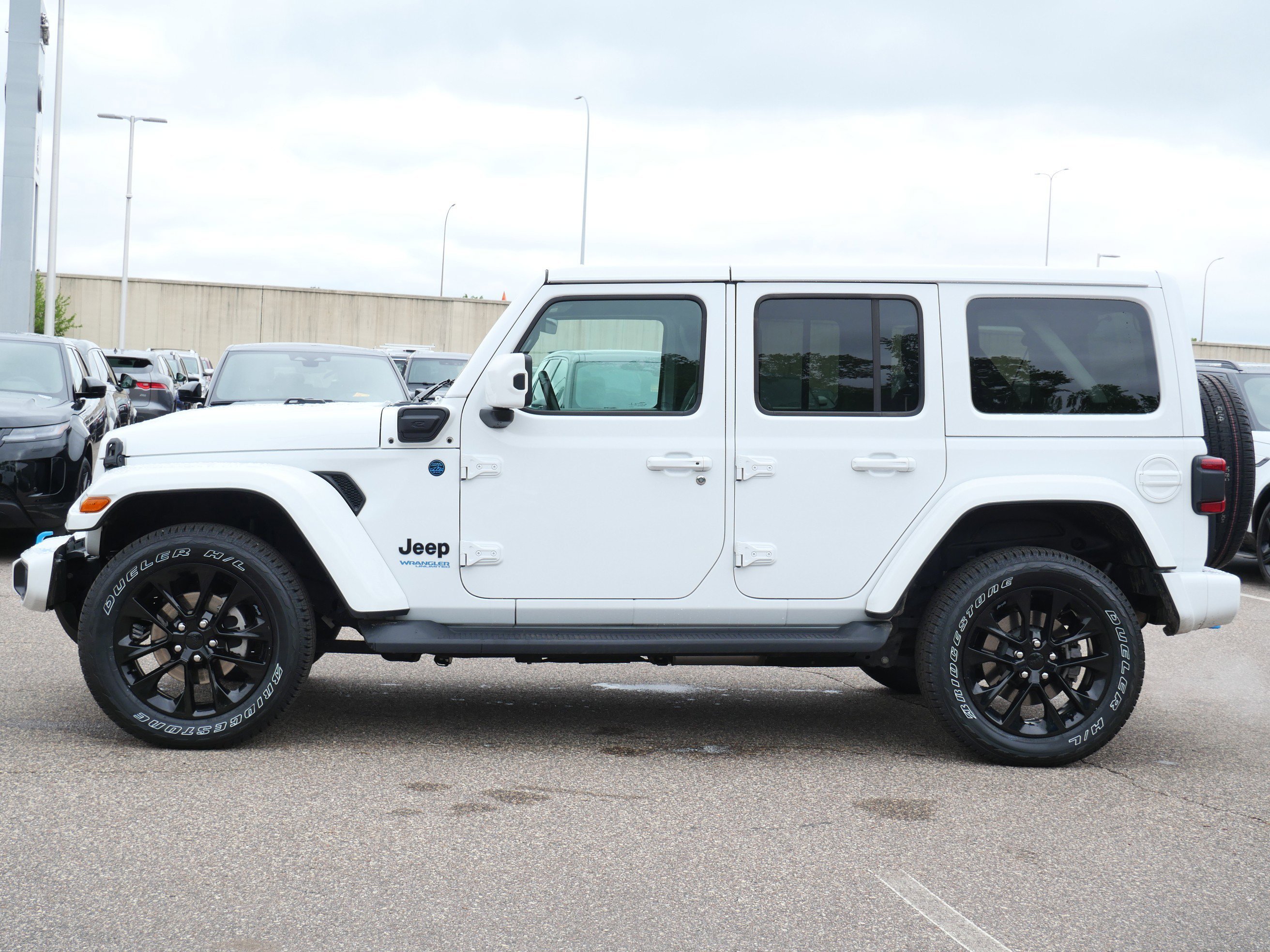 Used 2021 Jeep Wrangler Unlimited High Altitude 4XE with VIN 1C4JJXP62MW642761 for sale in Minneapolis, Minnesota