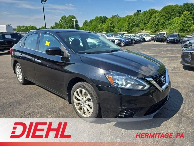 Used 2018 Black Nissan SV image 1