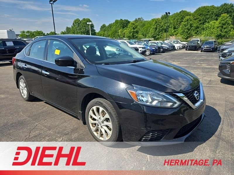 Used 2018 Black Nissan SV image 1