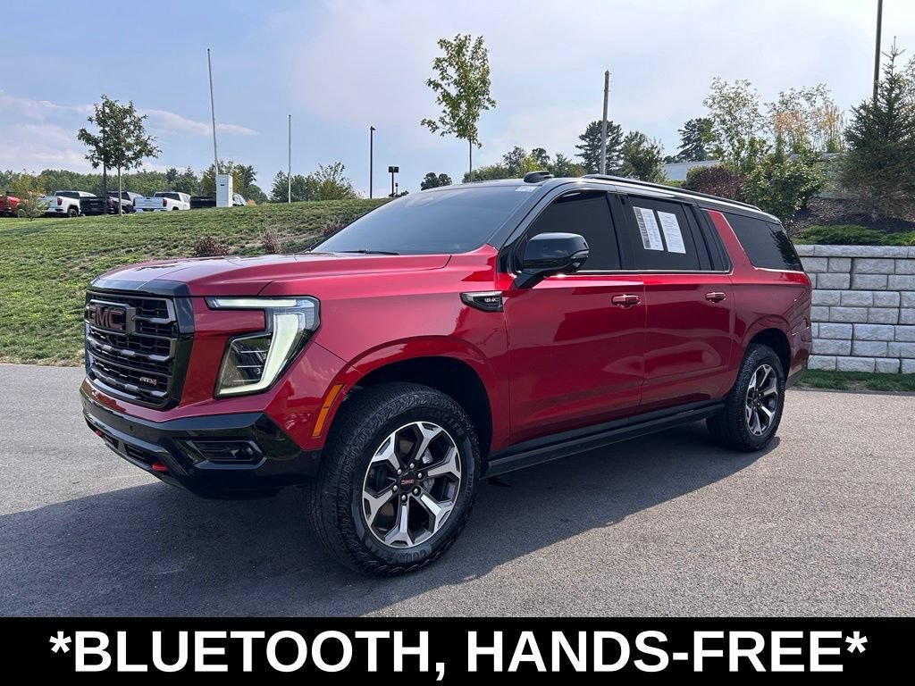 Used 2025 Volcanic Red Tintcoat GMC AT4 Ultimate image 5