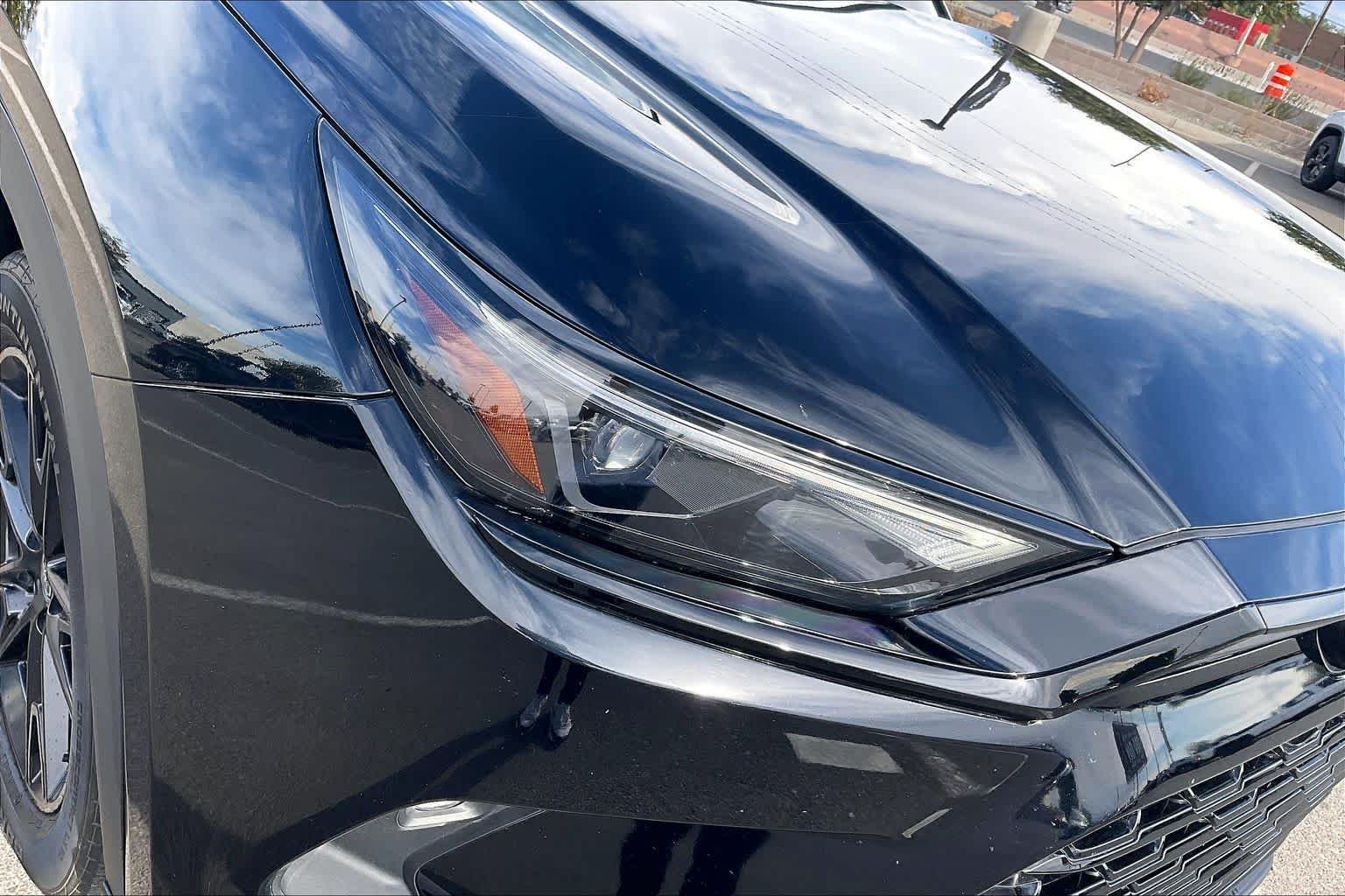 Used 2025 Midnight Black Metallic Toyota Hybrid Nightshade Edition image 28