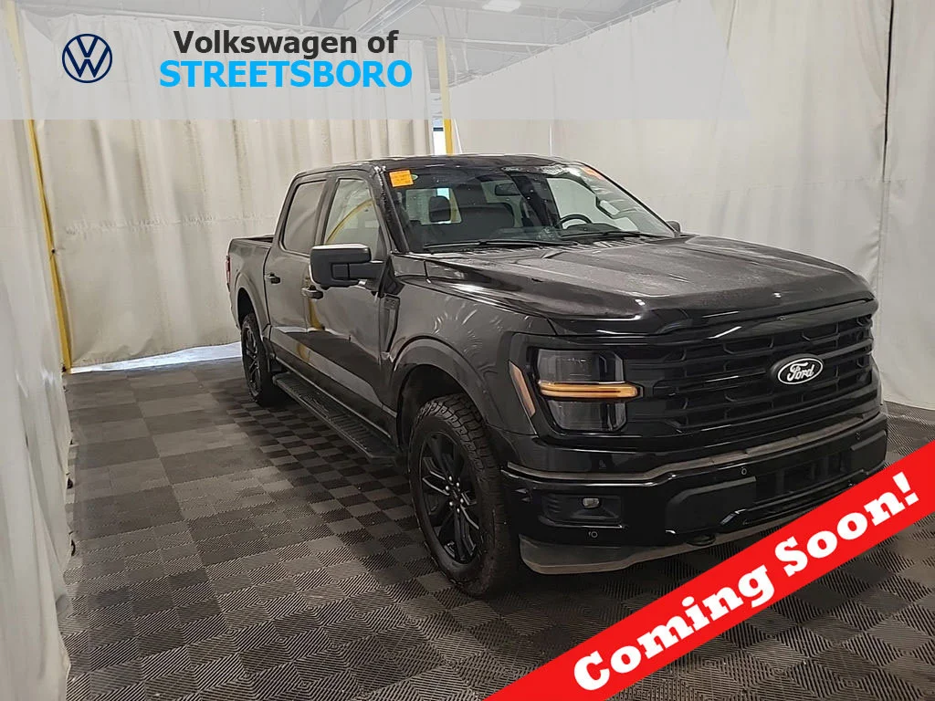 Used 2024 Agate Black Metallic Ford XLT image 1