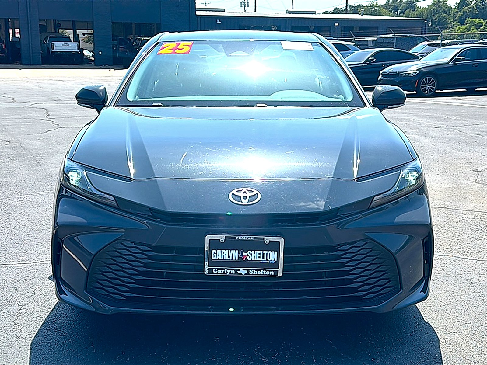 Used 2025 Super Black Toyota LE image 11