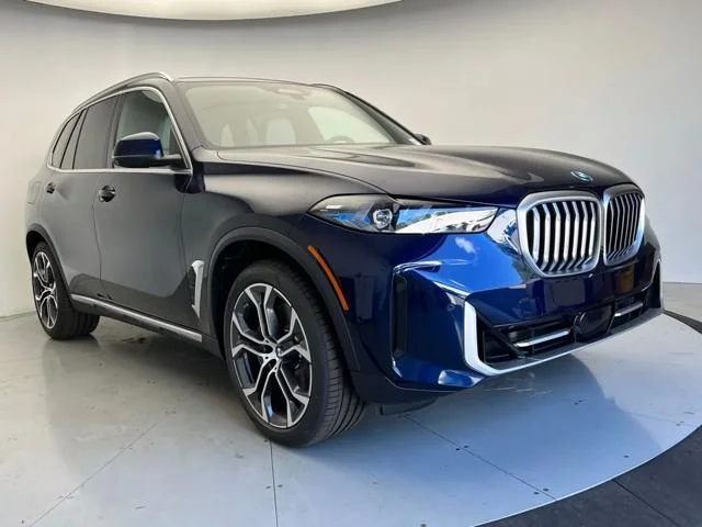 New 2026 Tanzanite Blue II Metallic BMW xDrive50e image 2