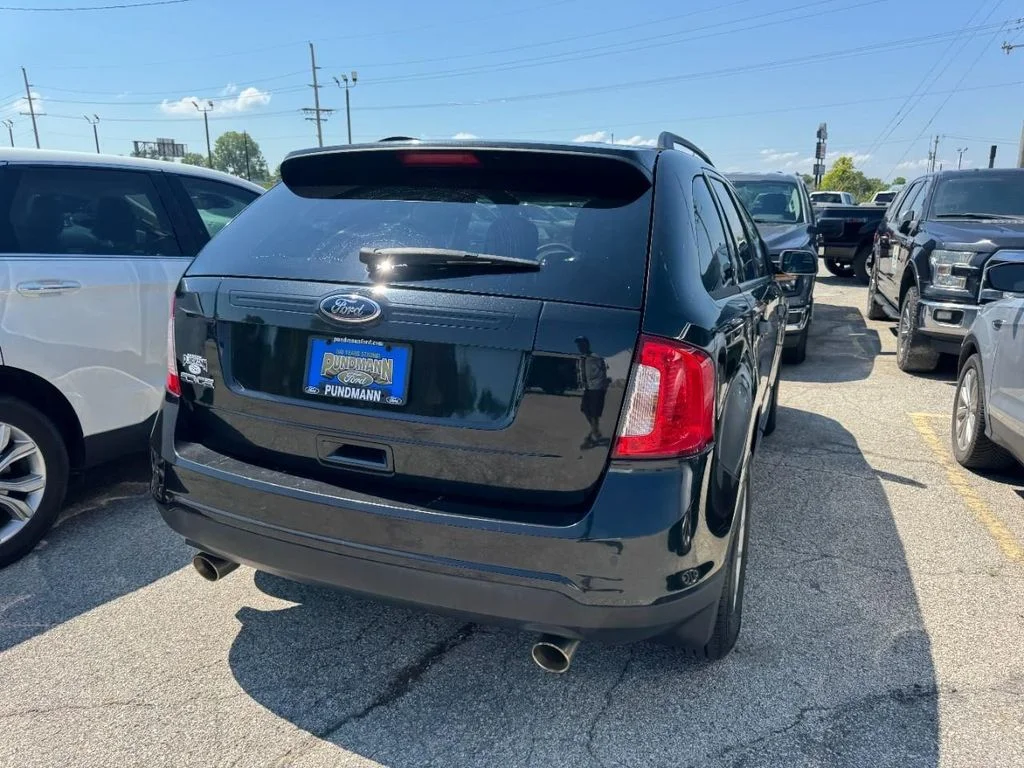 Used 2013 Tuxedo Black Metallic Ford SE image 9