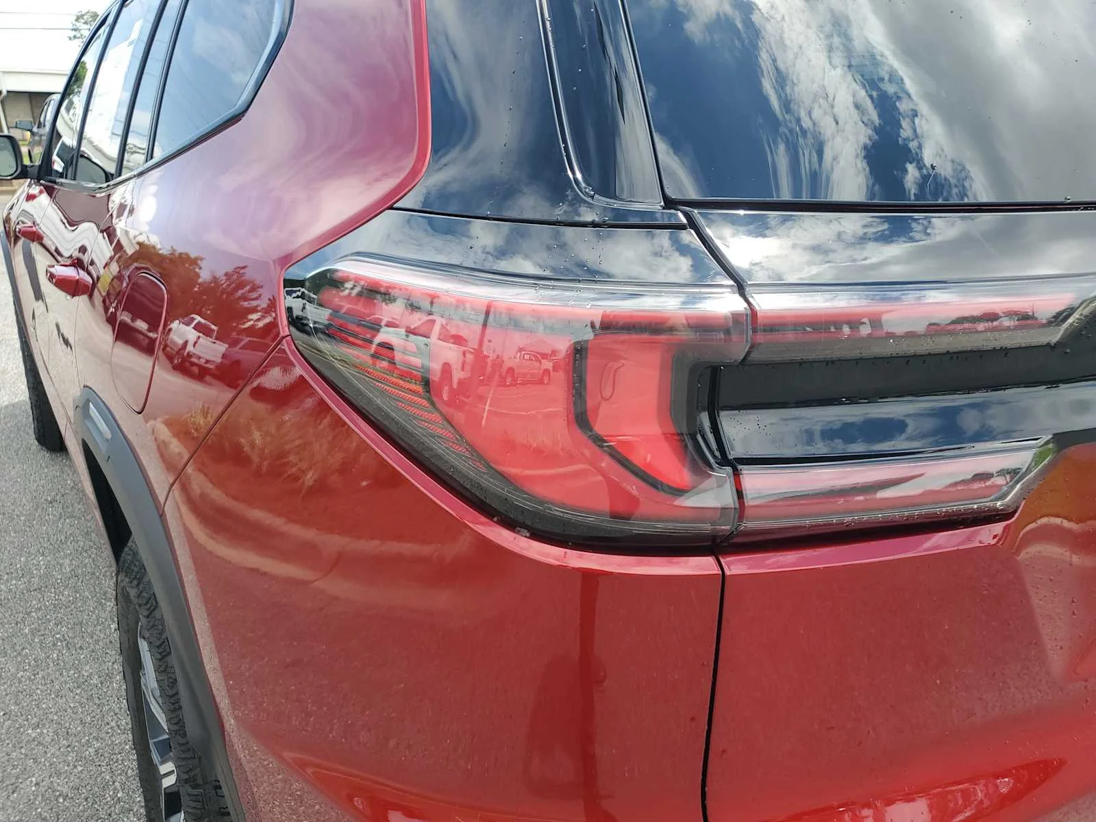 New 2026 Volcanic Red Tintcoat GMC AT4 image 14