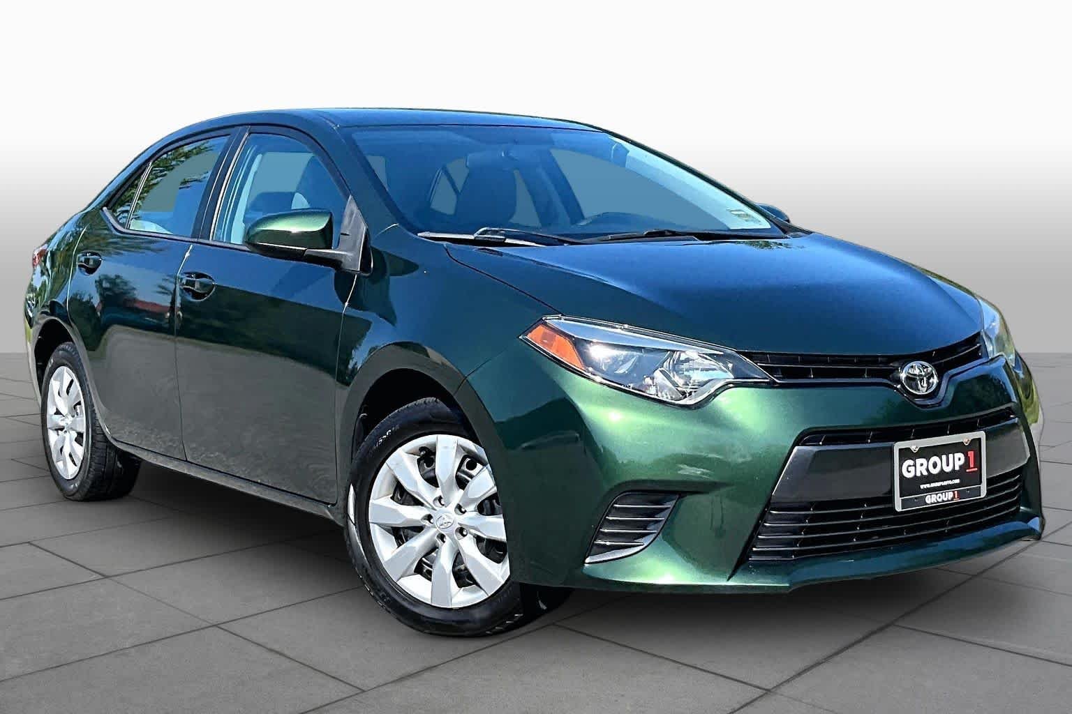 Used 2016 4Evergreen Metallic Toyota LE image 3