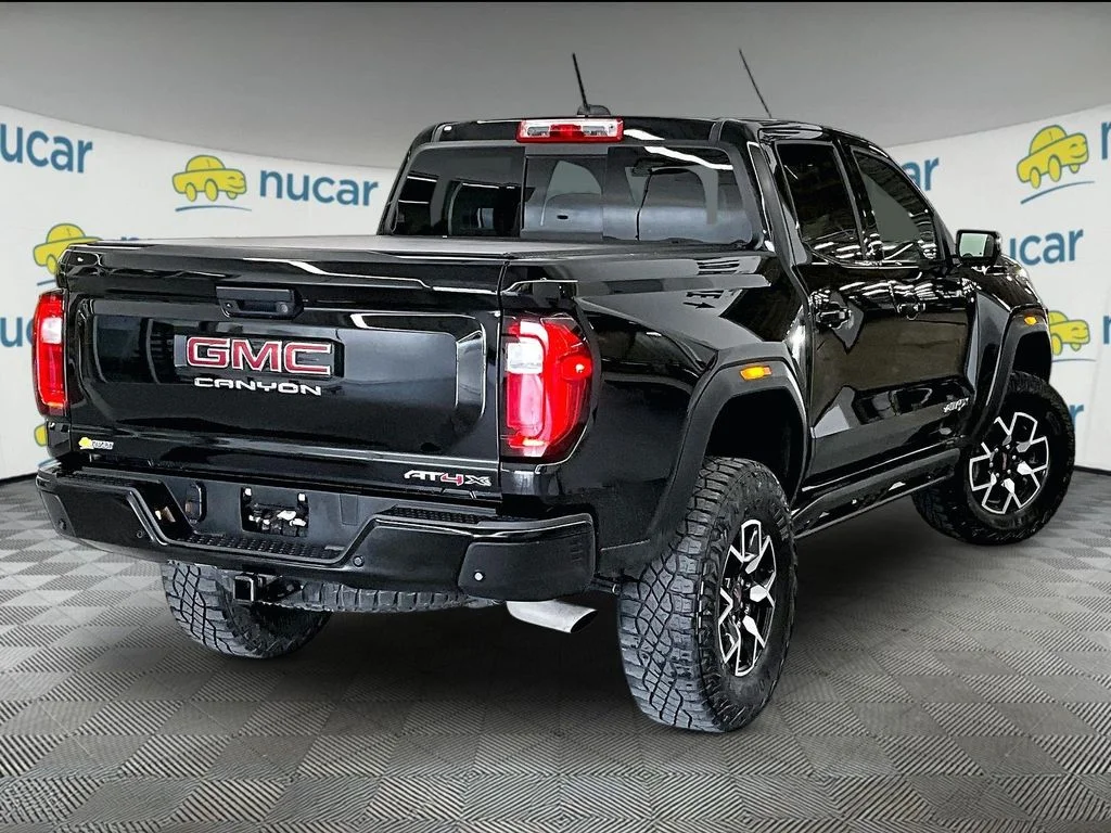 Used 2023 Onyx Black GMC AT4X image 6