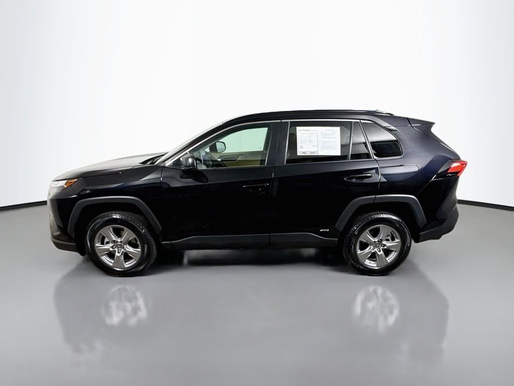 Used 2024 Midnight Black Metallic Toyota Hybrid LE image 4