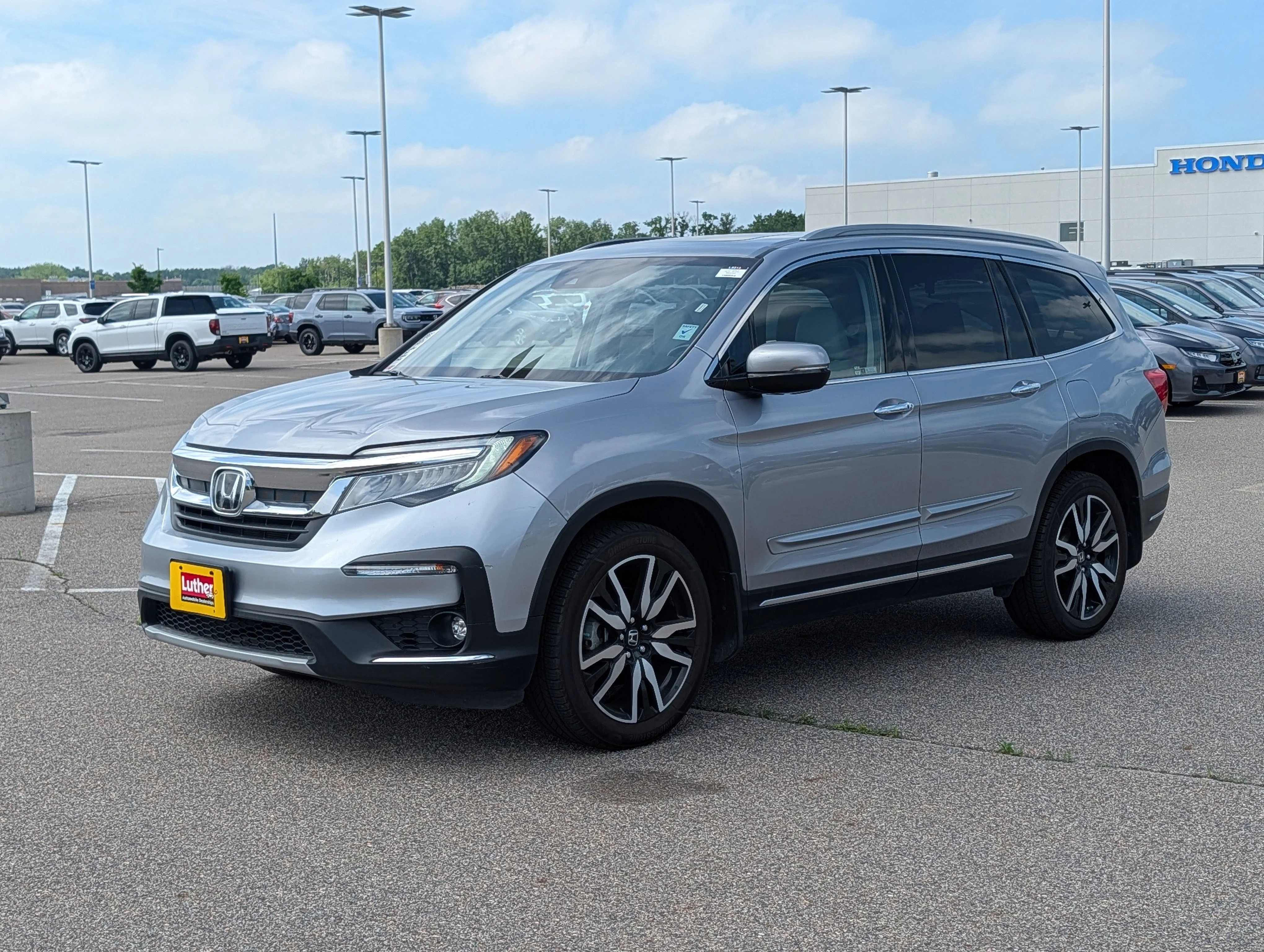 Used 2022 Honda Pilot Touring with VIN 5FNYF6H93NB002003 for sale in Waite Park, Minnesota