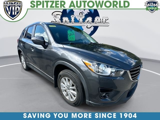 Used 2016 Meteor Gray Mazda Touring image 1