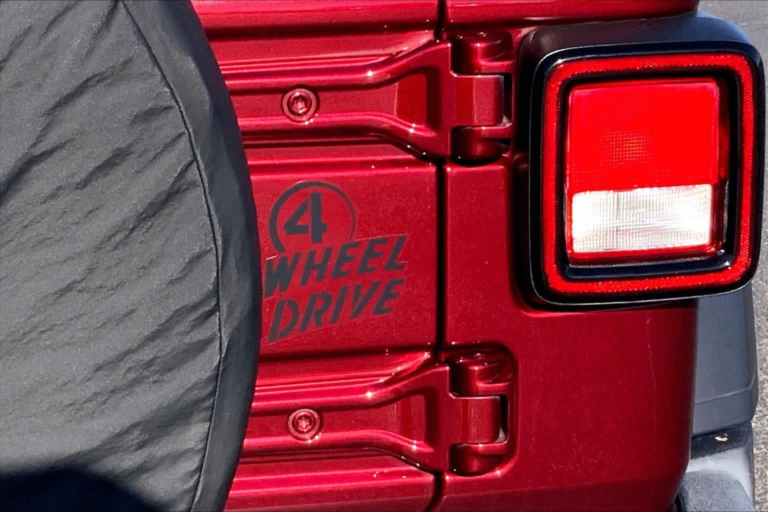 Used 2021 Snazzberry Pearlcoat Jeep Unlimited Willys Sport image 10