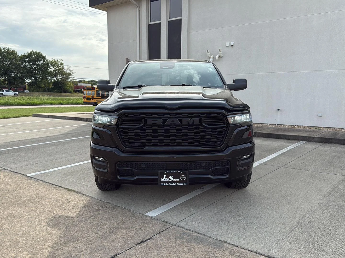 Used 2025 Diamond Black Crystal Pearlcoat Ram Tradesman image 2
