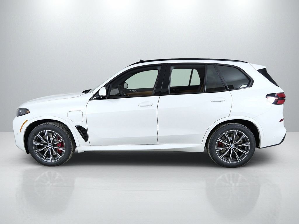 Used 2026 Mineral White Metallic BMW xDrive50e image 16
