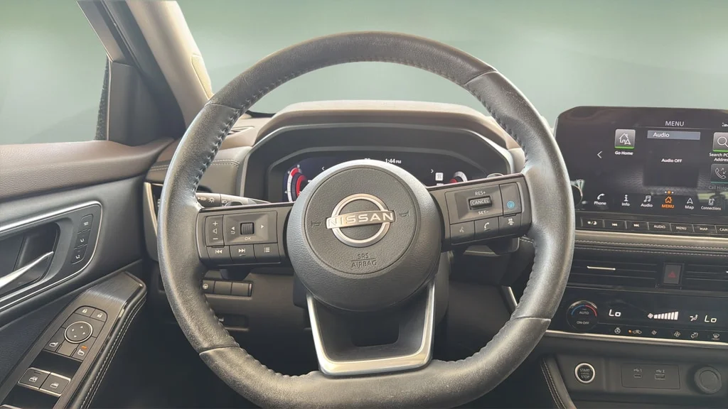 Used 2023 Champagne Silver Metallic Super Black Nissan Platinum image 9