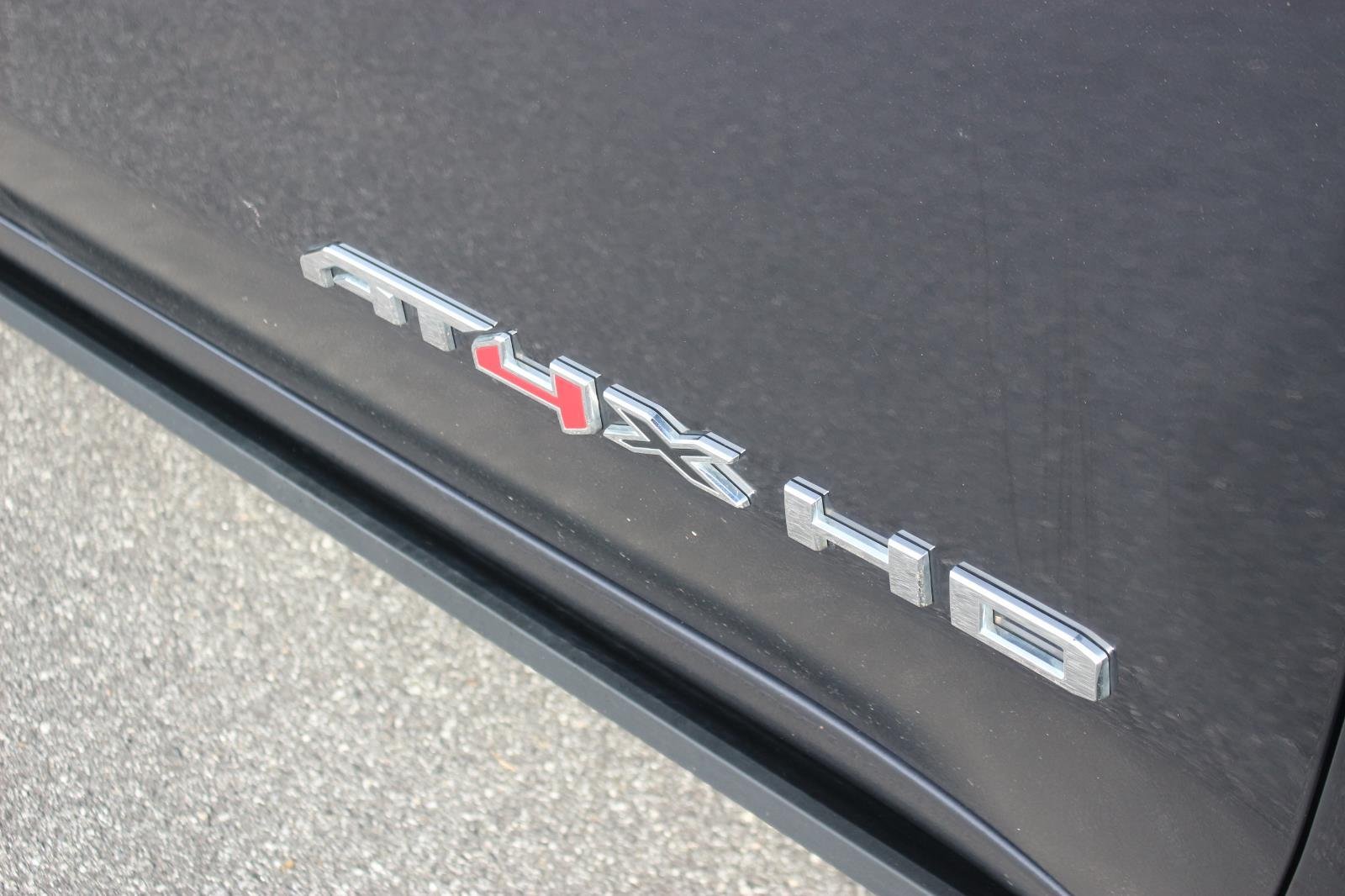 Used 2024 Titanium Rush Metallic GMC AT4X image 11