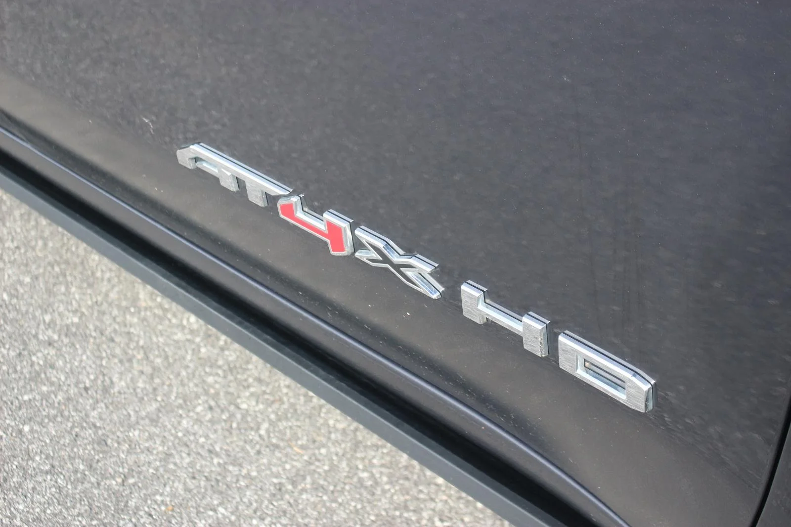 Used 2024 Titanium Rush Metallic GMC AT4X image 11