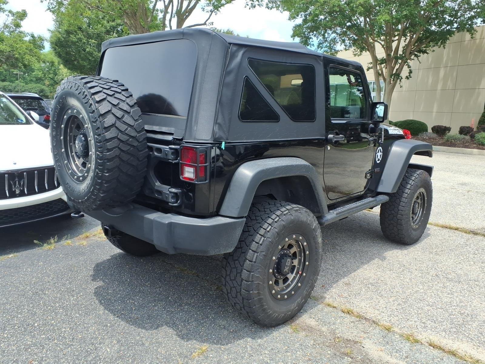 Used 2017 Black Clearcoat Jeep Sport image 3